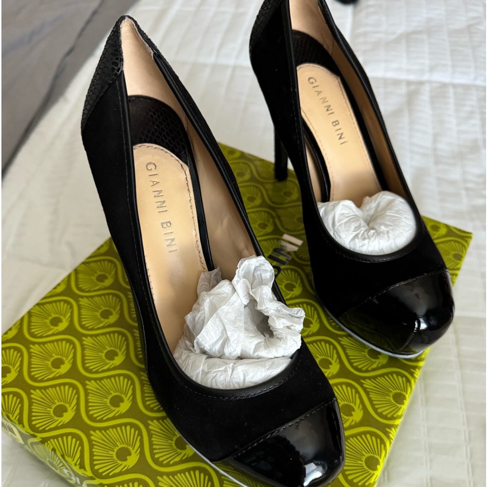 Black suede and patent leather platform pumps